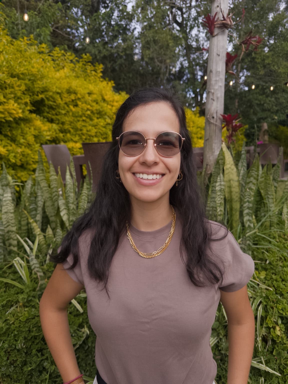María Marquez Sosa smiling in a garden